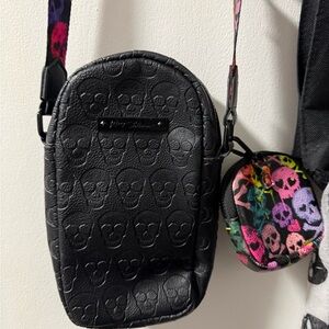 Black Betsy Johnson skull embossed crossbody bag